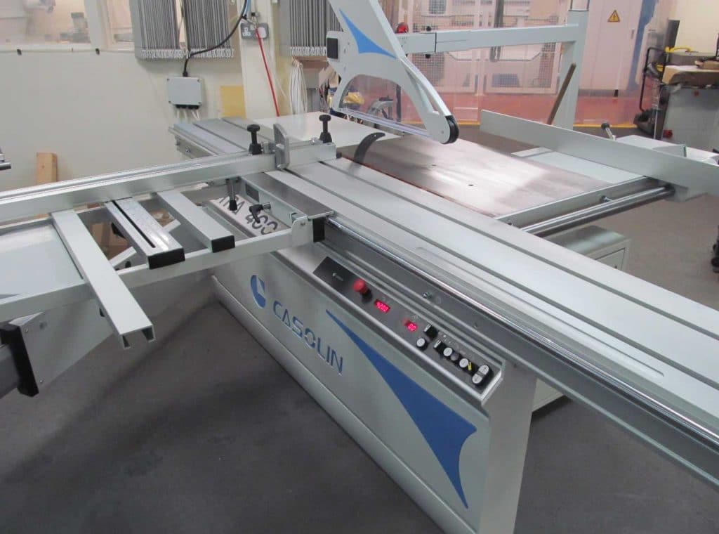 Casolin Astra SE400 NT panel saw with sliding table, rip fence, and scoring unit in a workshop setting
