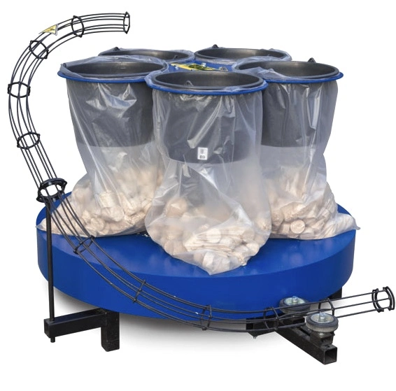 Blue Falach five bag carousel unit with clear plastic bags filled with tokens and a wire chute attachment